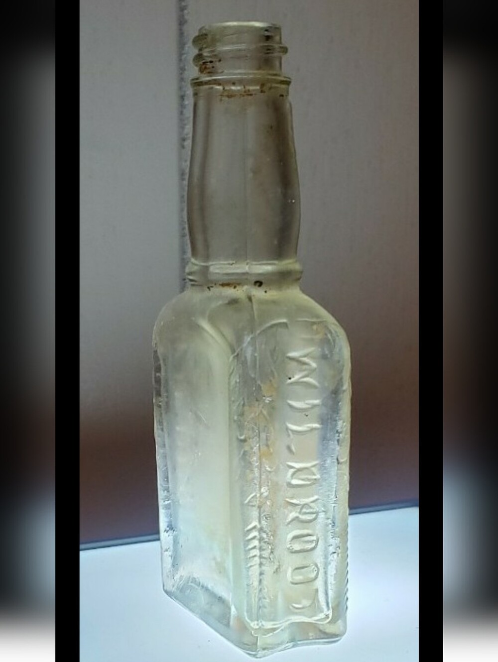 Antique Glass "Wildroot" Bottle